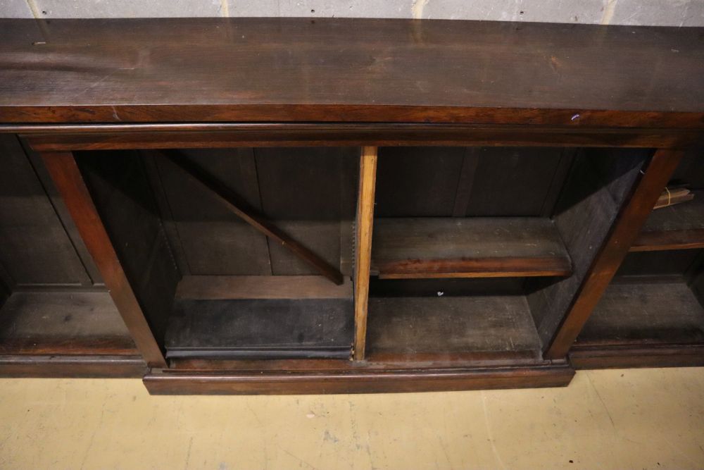 A Victorian rosewood breakfront open bookcase, width 264cm, depth 40cm, height 107cm